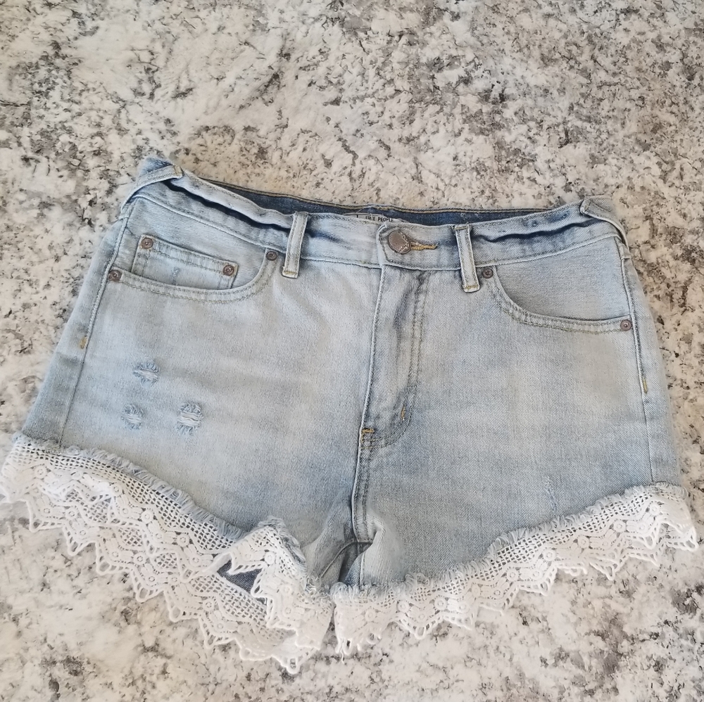 Free People denim shorts with lace edging